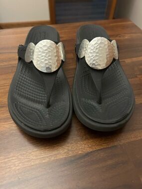 CROCS Black Thong Sandals with Hammered Silver Disks